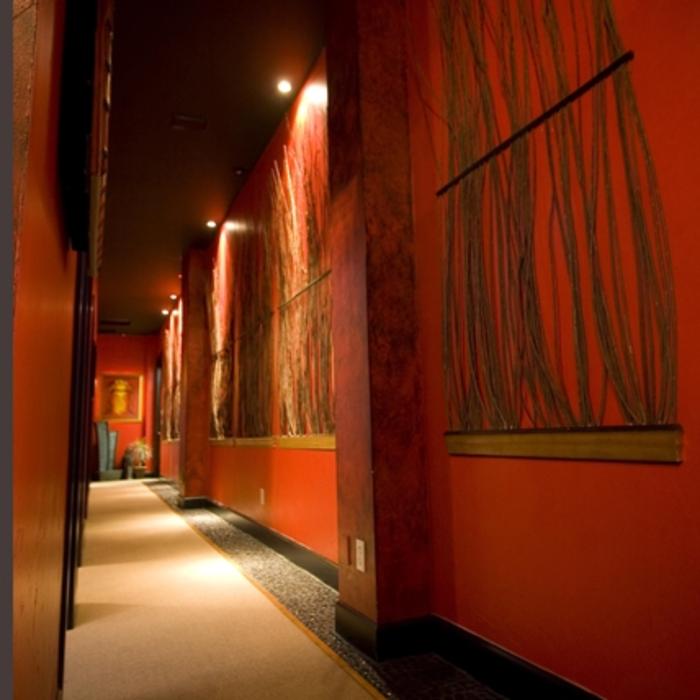 Asian theme hallway in the Spa area. Custom reed railings.