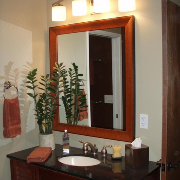 Sink, custom mirror and lighting