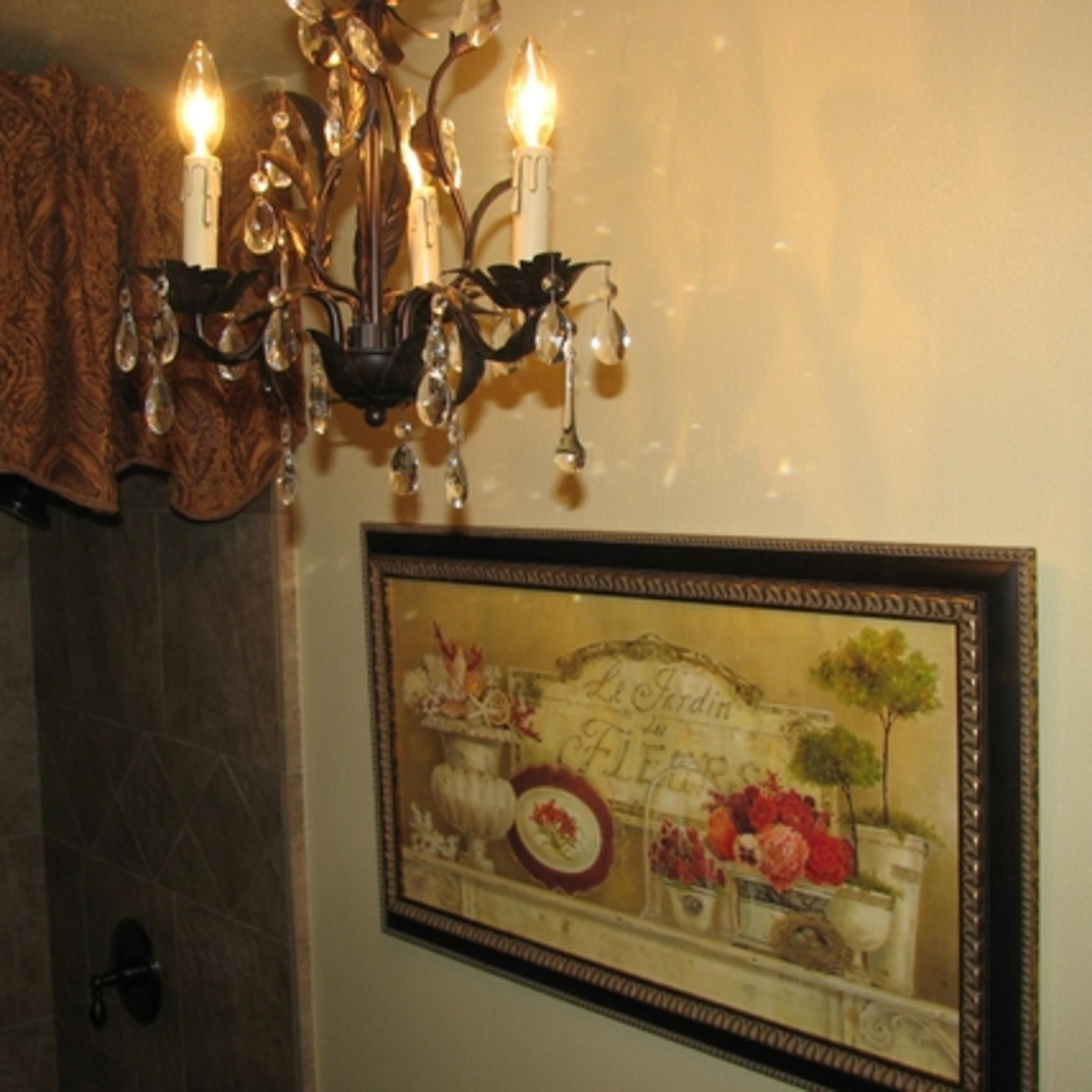 New chandelier and framed art