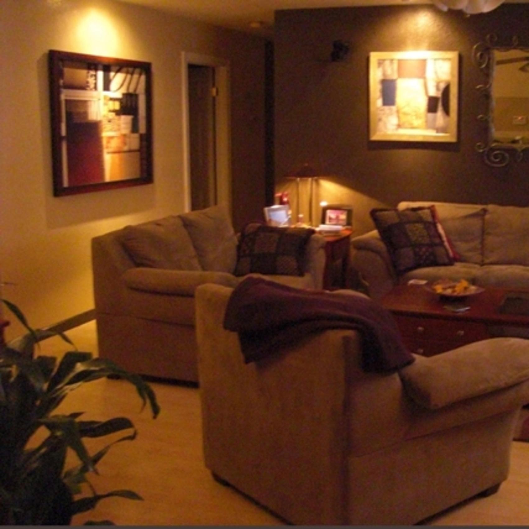 Living Room After... Dark Brown Accent Wall creates drama but the natural colors keep it inviting.